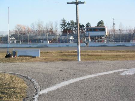 Whittemore Speedway - Grandstand And Tower With Track In The Foreground